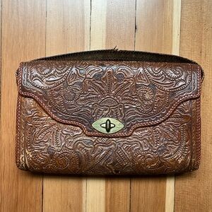 Vintage floral tooled leather clutch